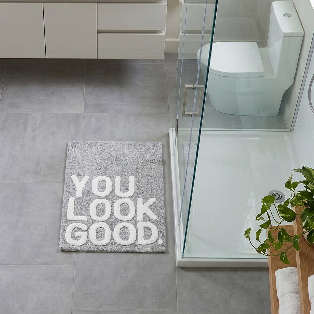 You look good slogan bath mat in grey and white - non slip backing.