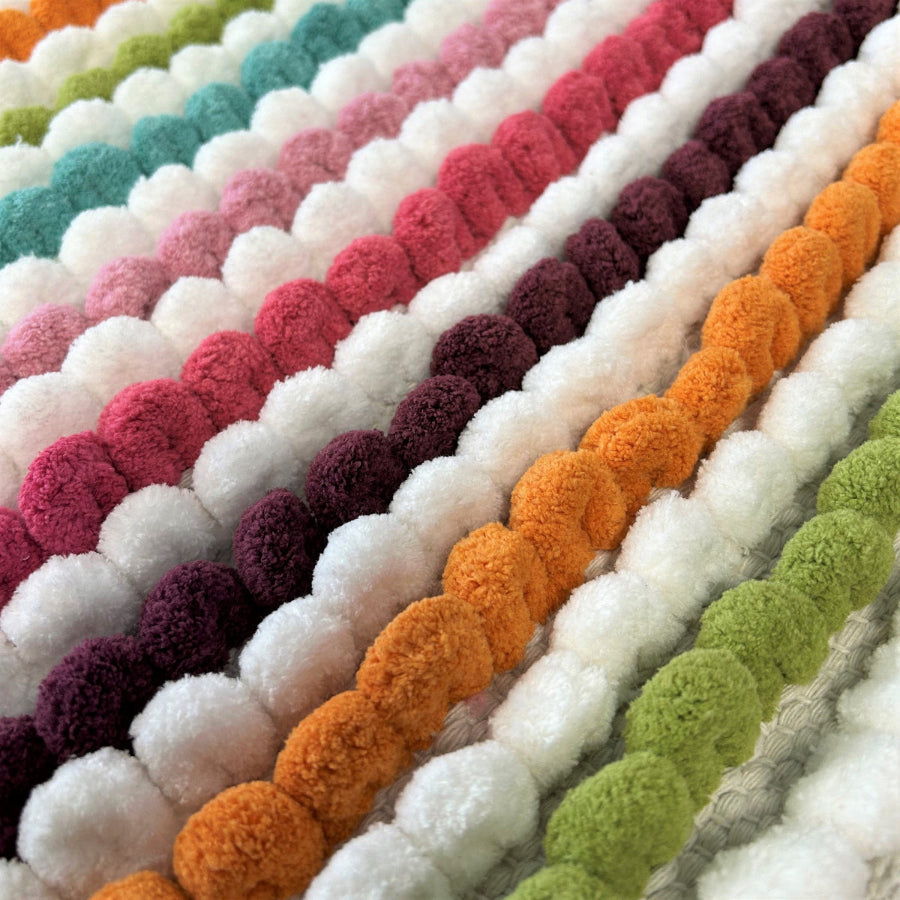 Multi coloured chunky bobble bathroom mats