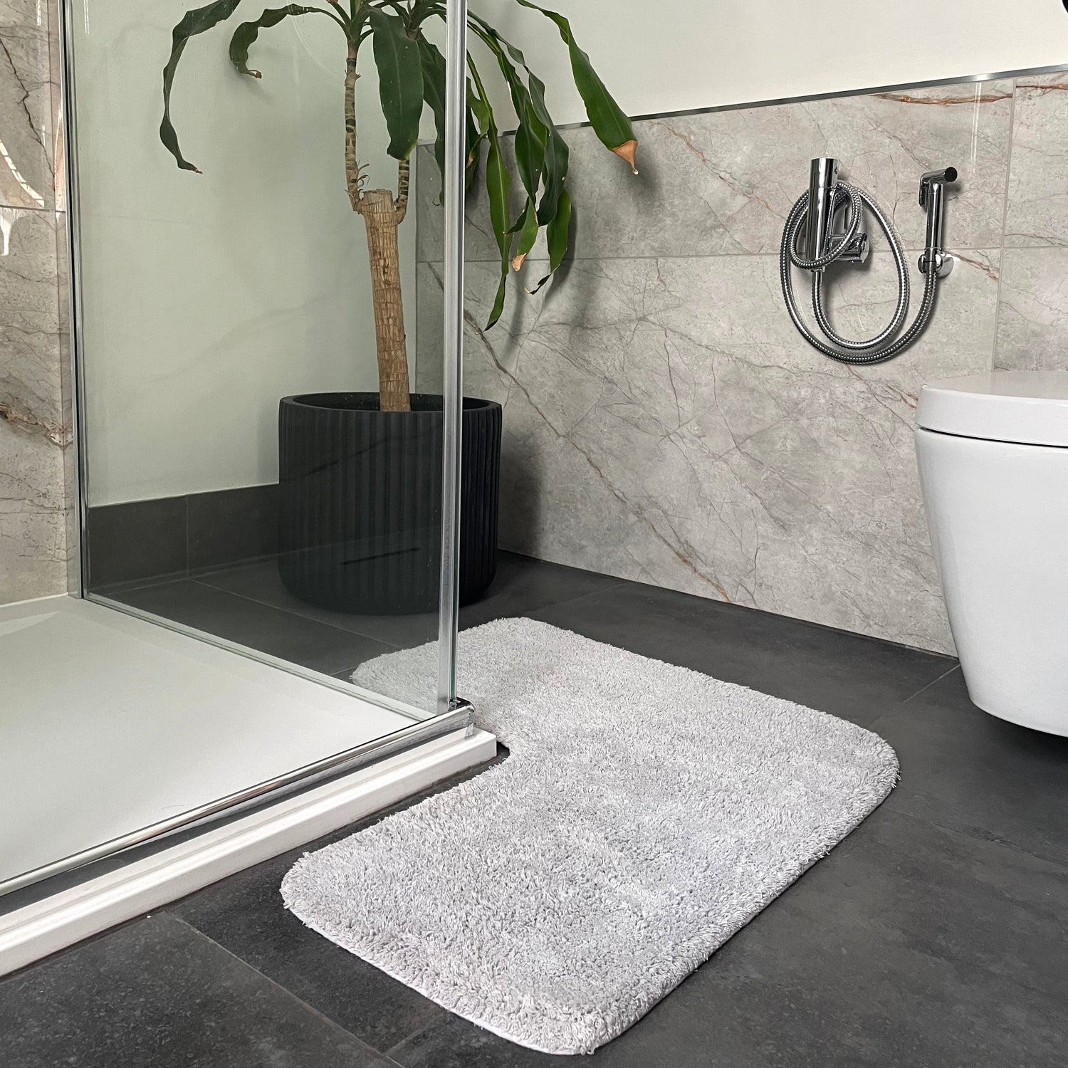 Light grey shaped corner bath mat - super soft cotton shower mat