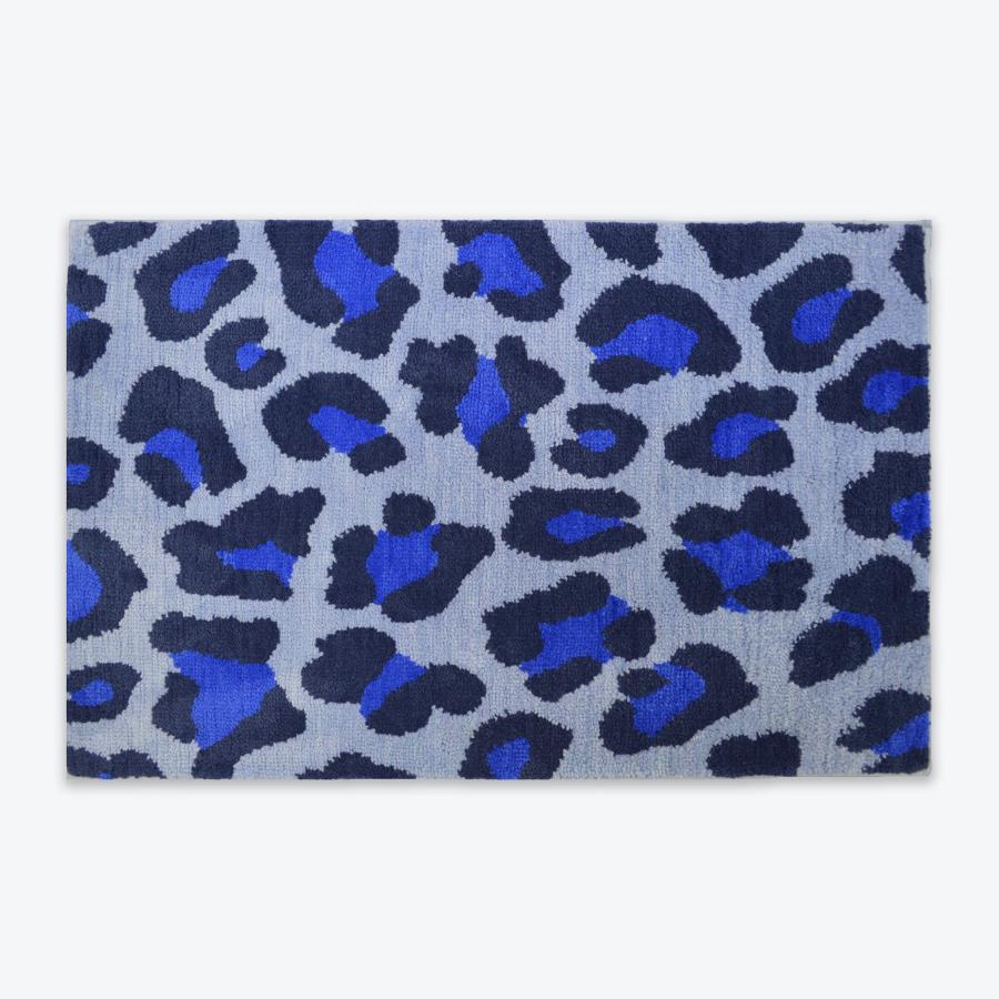 Large blue leopard print bath mat.
